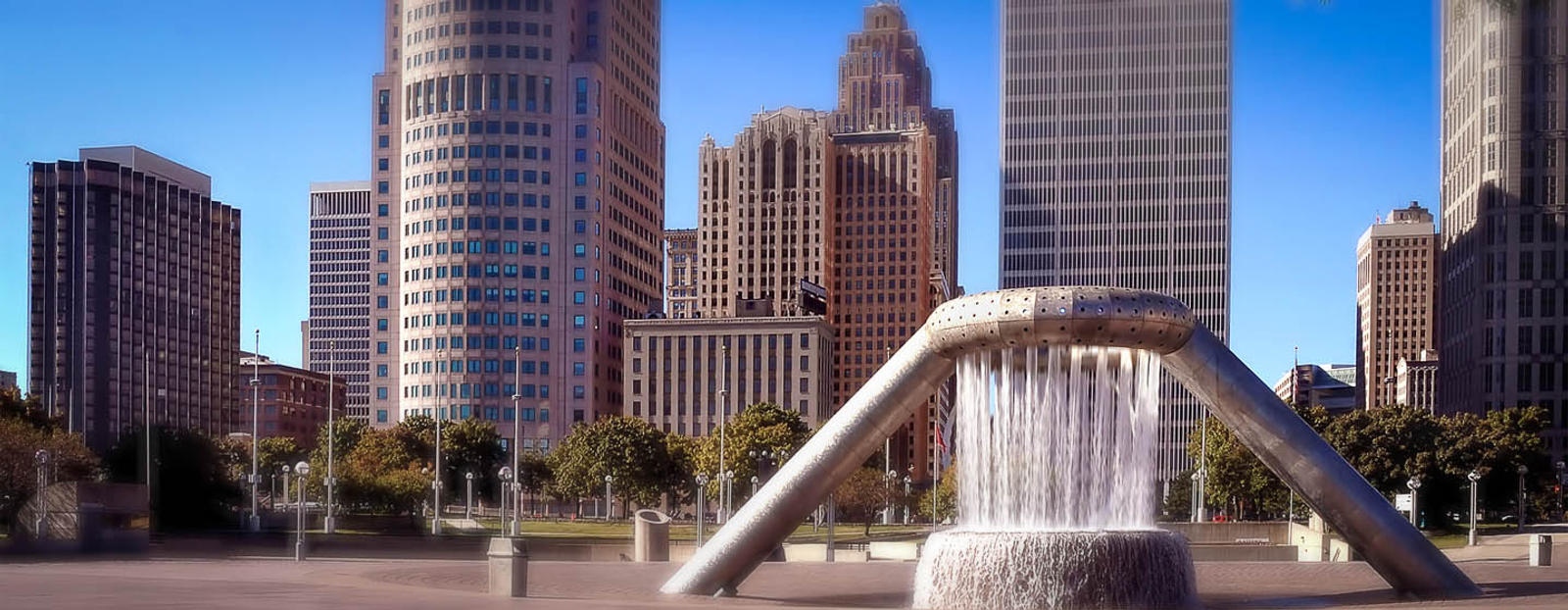 Fountain in city center with Detroit skyline