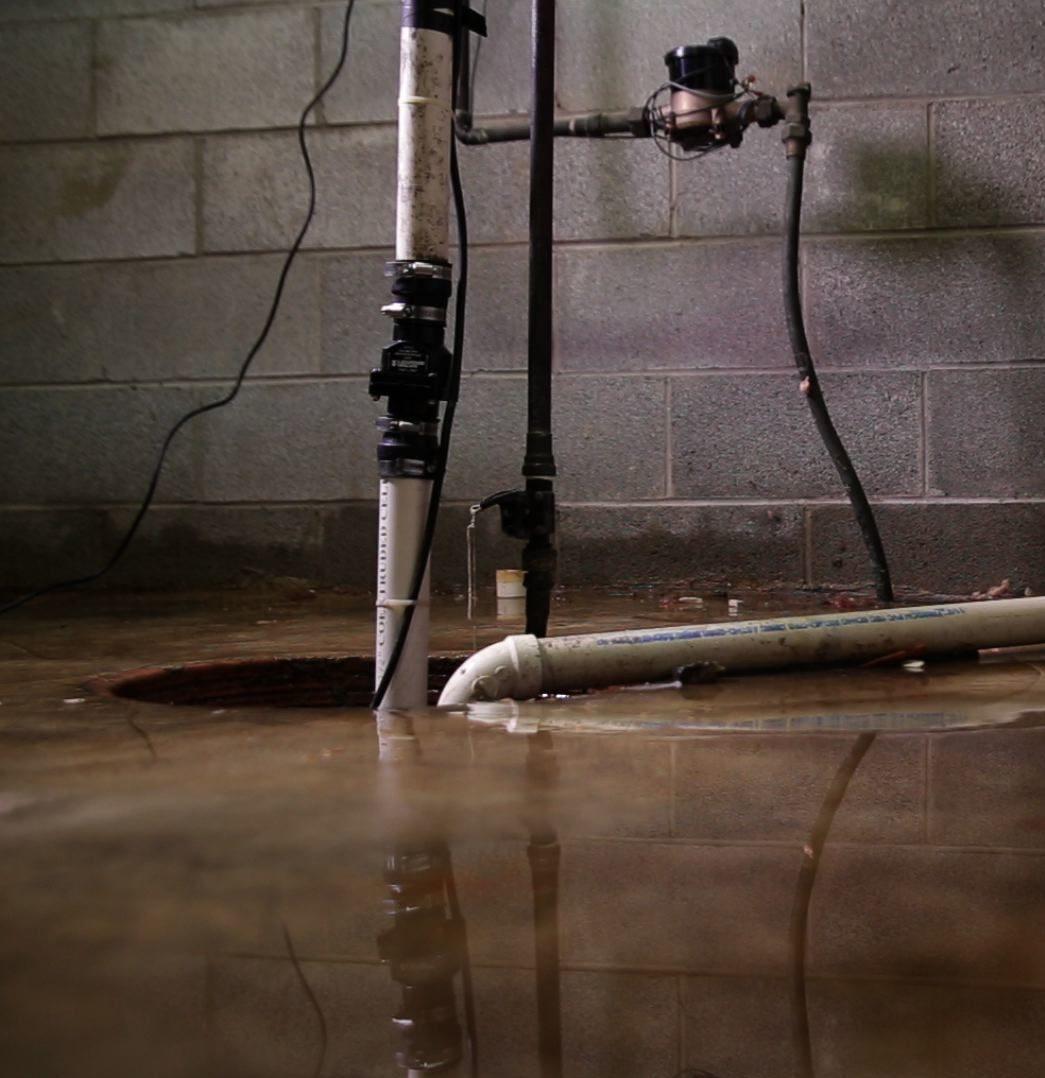 Flooded basement with faulty sump pump