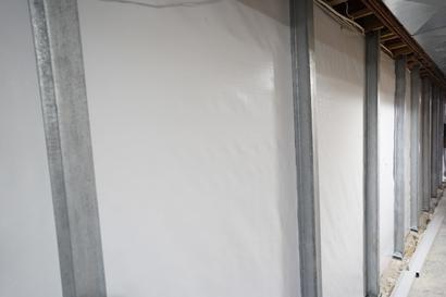 IntelliBrace installed on basement walls with WallSeal
