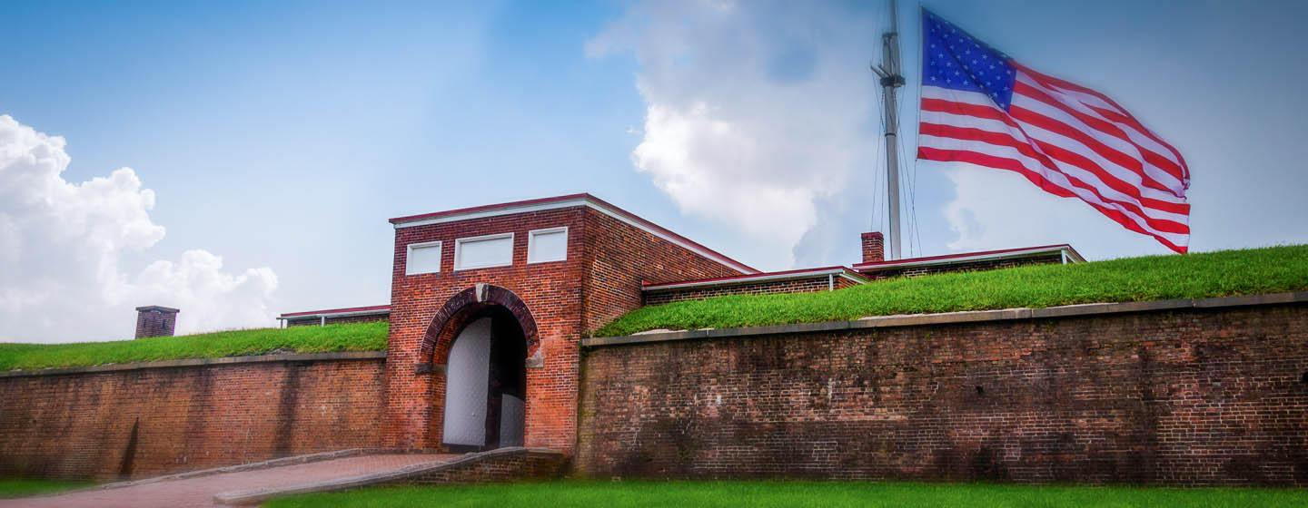 Brick tunnel with flag in Baltimore