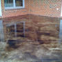 water pooled next to house