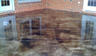 water pooled next to house