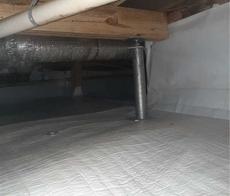 Crawl space with insulated ductwork and a metal support rod under a wooden beam.