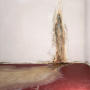 Crack in wall leadinginto floor, with water leaking through