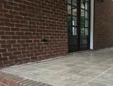 crack in between floor and wall of concrete patio