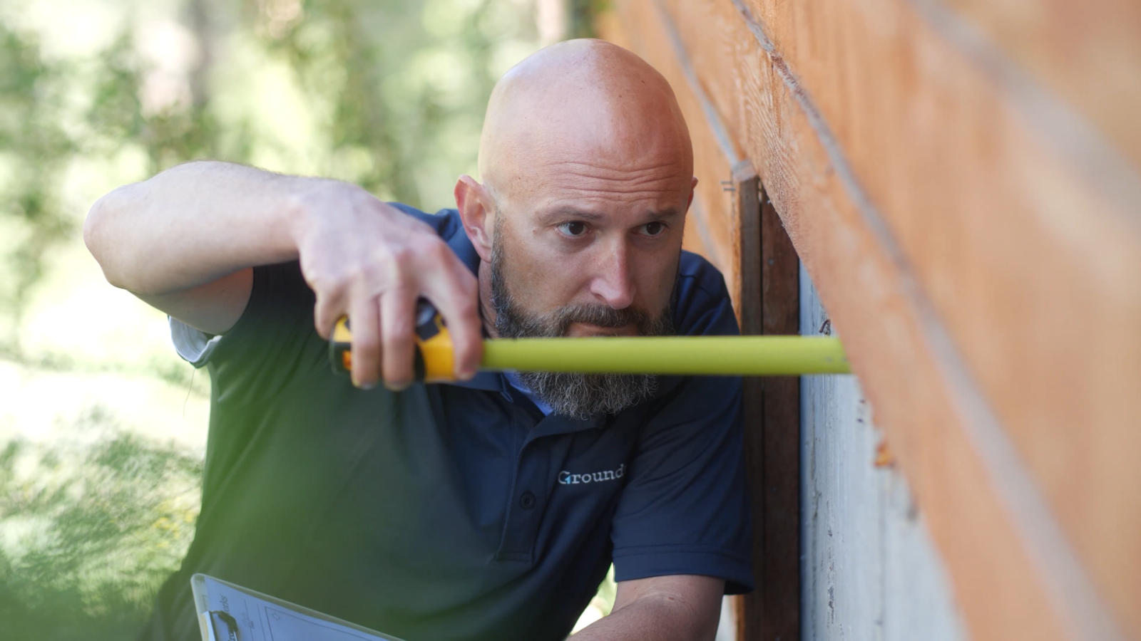 Groundworks Certified Field Inspector with tape measure