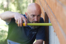 Groundworks Certified Field Inspector with tape measure