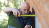 Groundworks Certified Field Inspector with tape measure