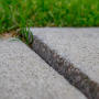 cracked concrete sidewalk