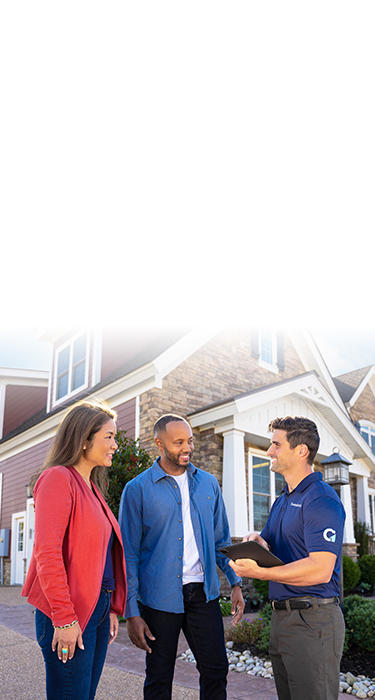 Couple with CFI discussing outside of the home.