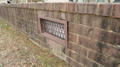 Exterior open crawlspace vent,