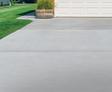 Leveled driveway with garage.