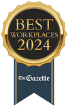 Gold and navy badge reading "Best Workplaces 2024, The Gazette" in Colorado Springs.