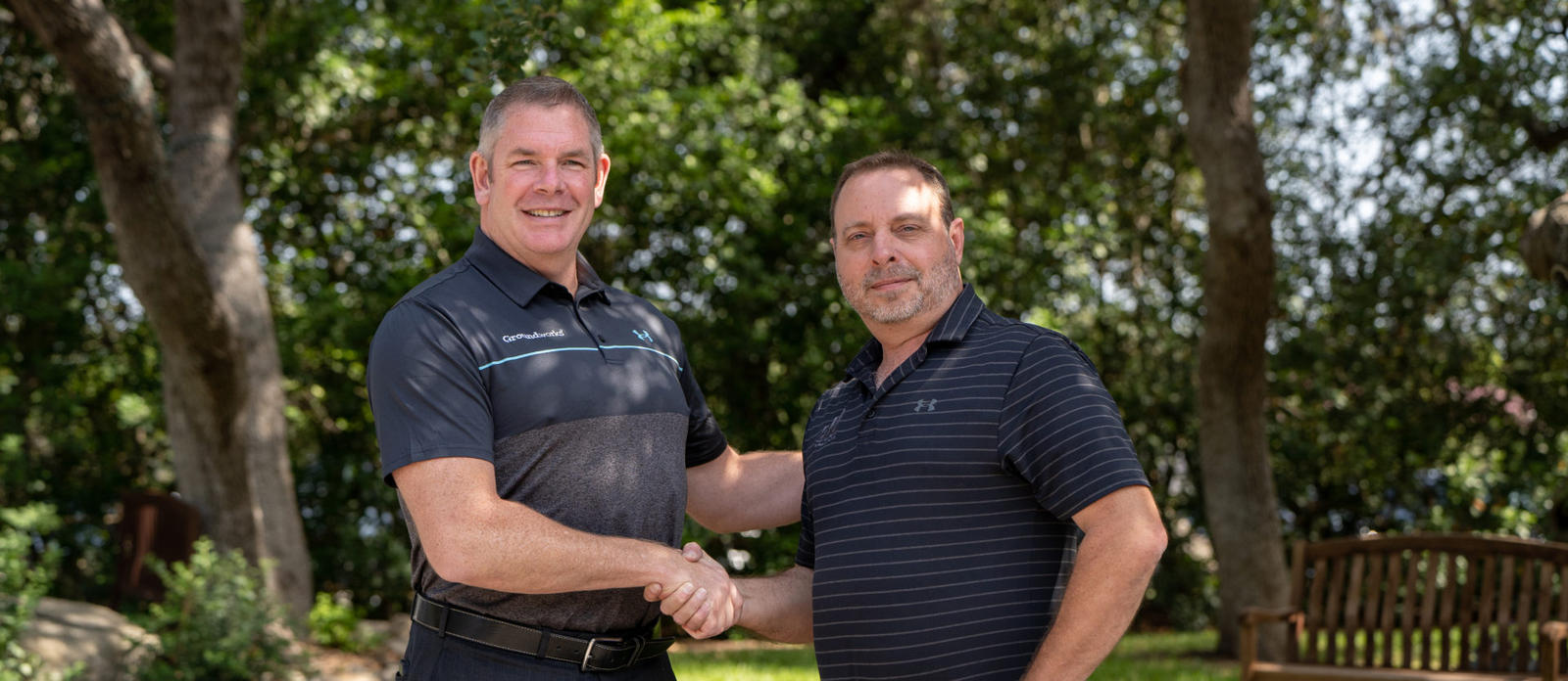 Matt Malone and founder of FSS shaking hands.