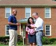 CFI and the couple are discussing outside of the home.