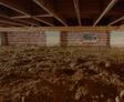 Crawlspace with a dirt floor and open vents.