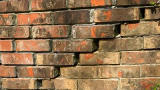 Cracking exterior brick wall.