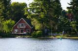 A cottage home on a lake.