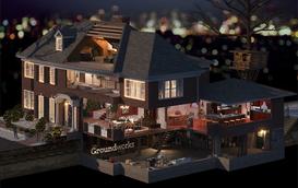 Cutaway view of a large house with a detailed interior, showing multiple floors, rooms, and a treehouse outside at night.