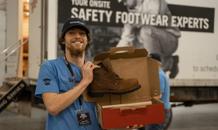 Groundworks crew holding boots