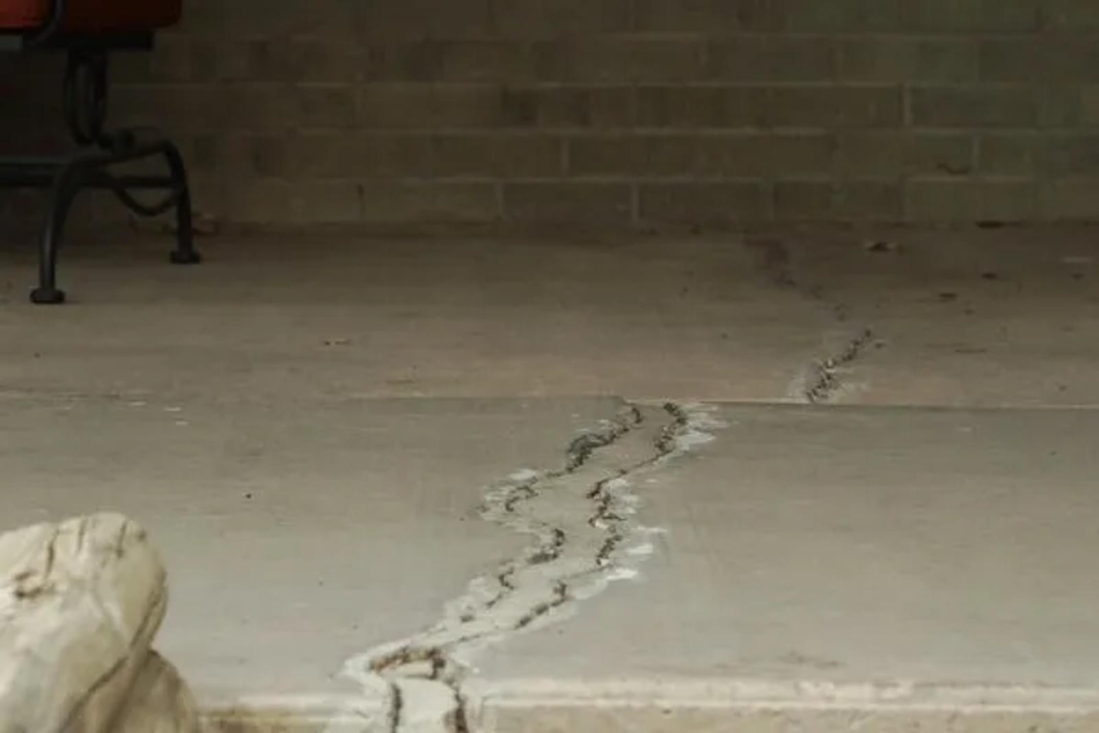 Crack exterior porch.