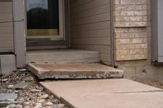 Uneven front porch step