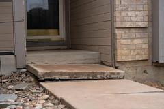 Uneven front porch step