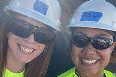 Groundwork's volunteers on project site with hardhats.