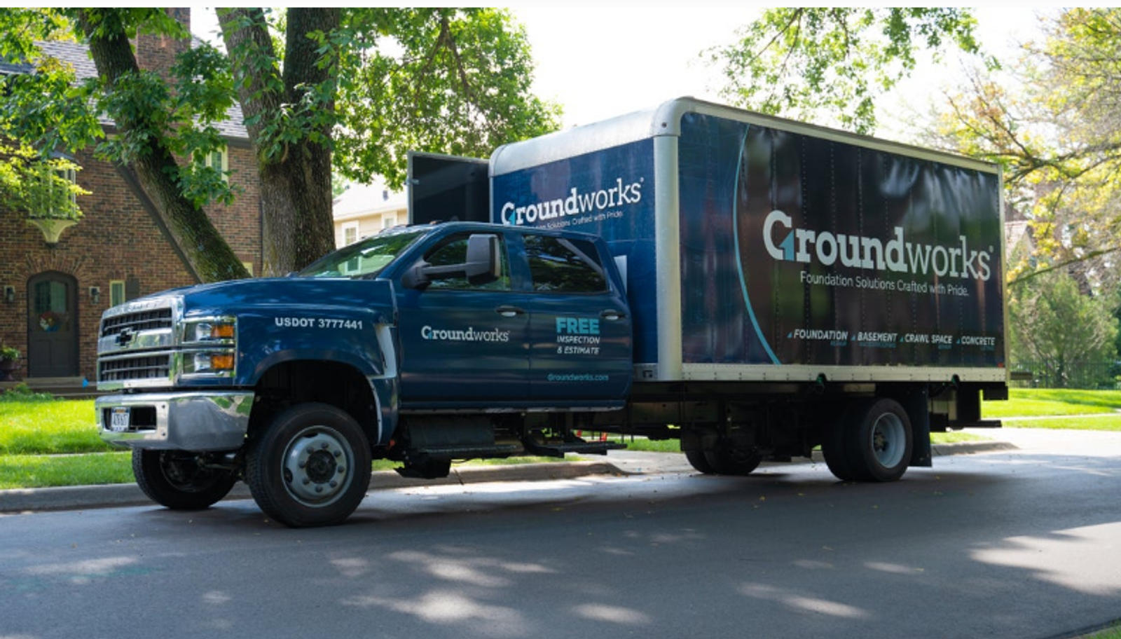 Groundworks Truck in front of home