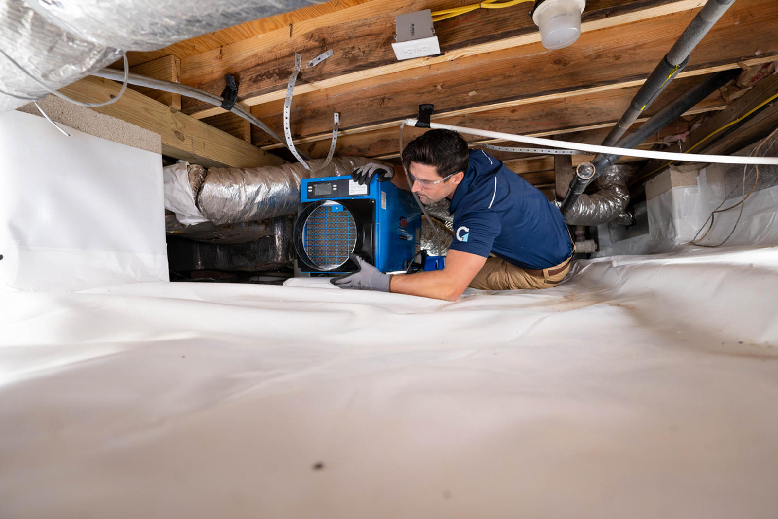 GW Crew dehumidifier installation in crawl space