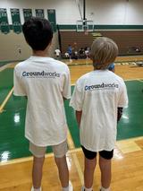 children wearing shirts with Groundworks' logo during Entry Level Basketball summer champs