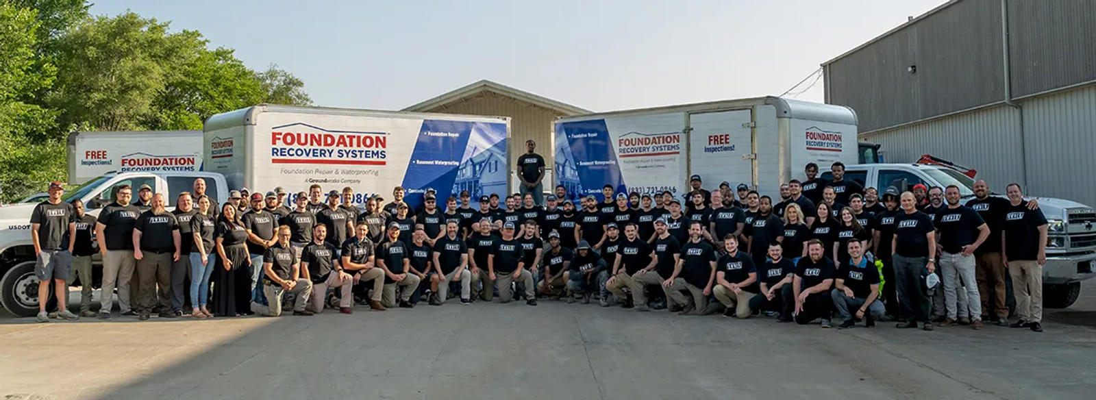 FRS employees standing in front box trucks