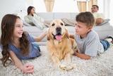 Family enjoying Living Room with Dog