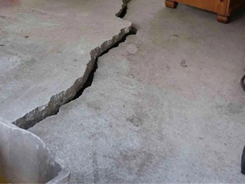 image of severe cracking in concrete floor creating trip hazard. How an Uneven Concrete Floor can Disrupt you Commercial Facility