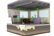 Cutaway illustration of an office with desks, chairs, and hanging lights above a foundation reinforced for structural stability.