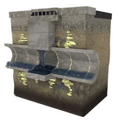 Underground view of a concrete sewer pipe with water flow and yellowish deposits, essential for stabilizing airport infrastructure.