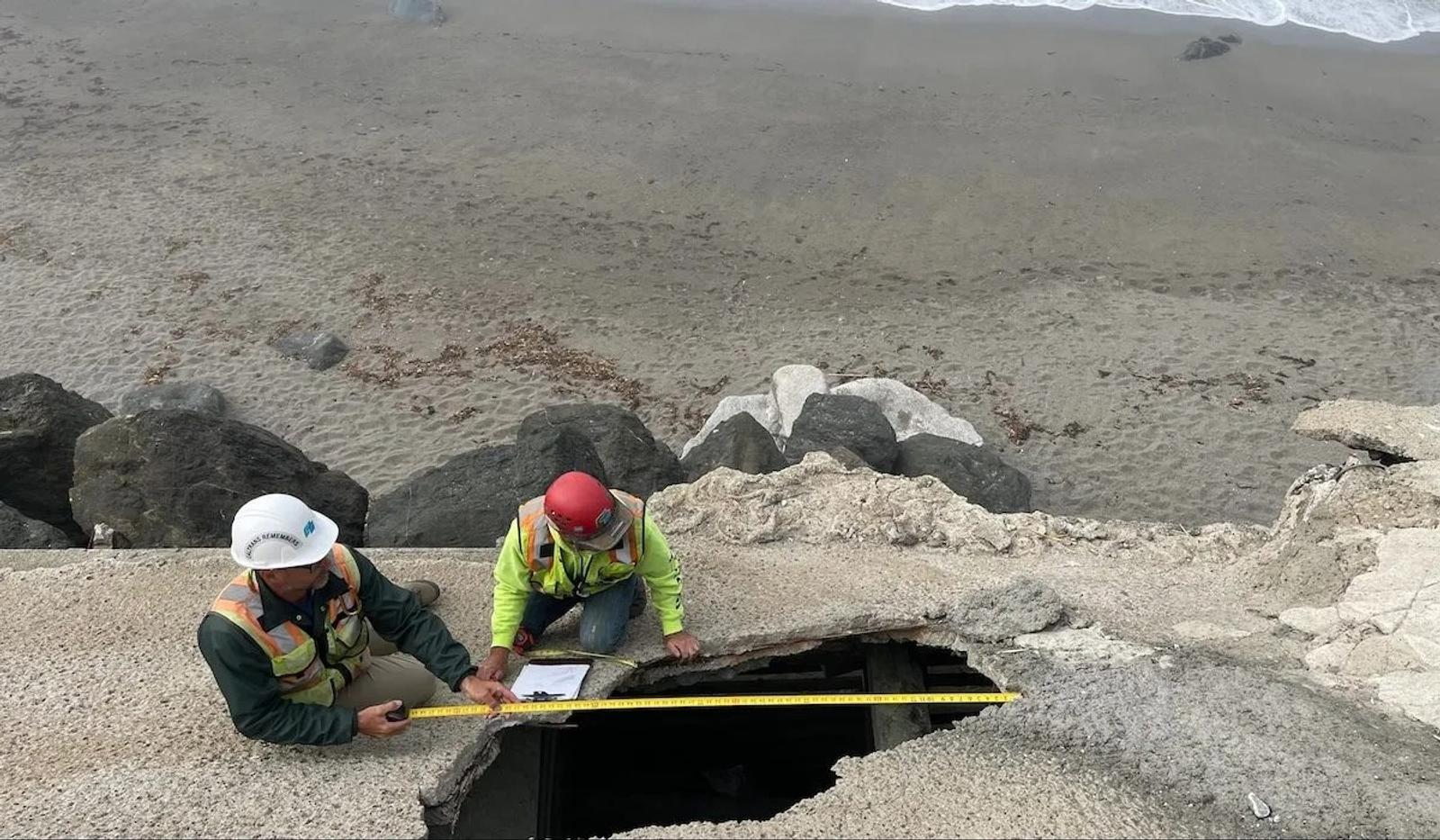 Two Workers Measuring Crib Wall Voids