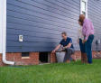 Groundworks inspector with homeowners
