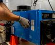 basement dehumidifier being checked