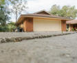 unlevel concrete driveway before repair