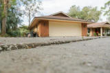 unlevel concrete driveway before repair