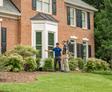 homeowner and inspector standing outside home