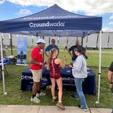 Attendants visiting the Groundworks booth at the NJSIAA Track & Field Group Championships