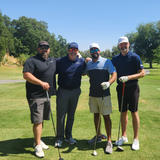 Four Groundworks team members pose for a photo at the Bay Area Regional Golf Tournament
