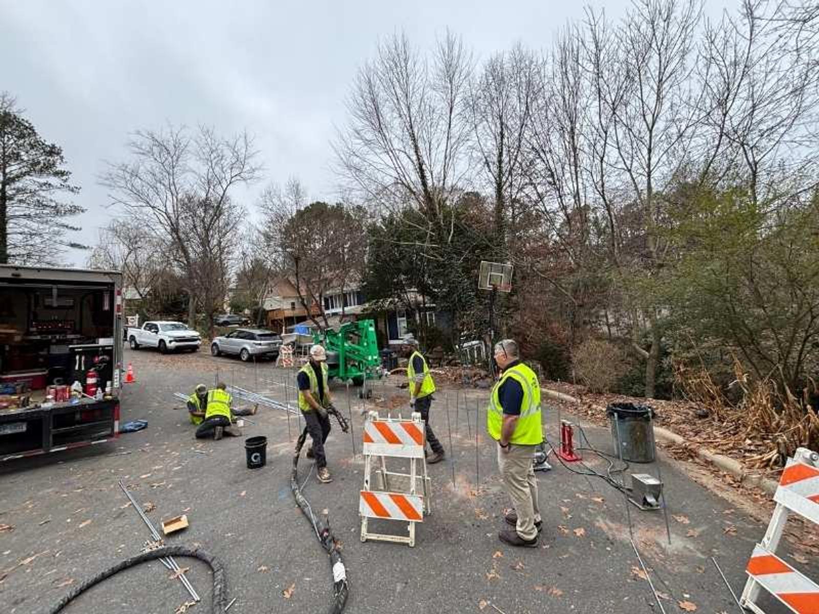 image of workers preparing for polyurethane injection soil stabilization