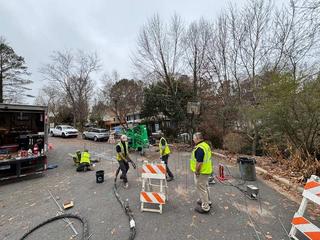 image of workers in cul-de-sac about to do polyurethane injection soil stabilization