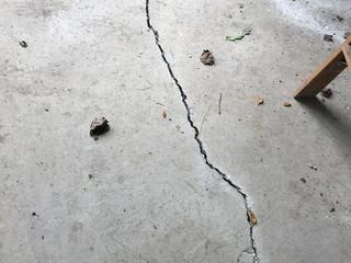 image of cracked concrete floor for How an Uneven Concrete Floor can Disrupt Your Commercial Facility