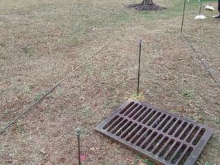 injection rods placed around stormwater drain for Lake Park Community Stormwater Pipe Joint Sealing