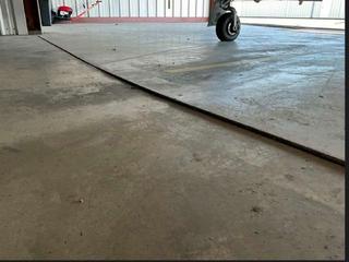 image of uneven concrete joints that are out of ADA Compliance at Storage Bay Slab Rehabilitation at Charlotte-Monroe Executive Airport