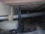 failing crawl space support jack and moisture barrier